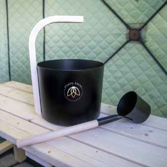 Firefly bucket and Ladel sitting on pine bench.